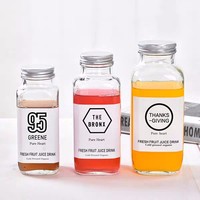 Vente en gros de bouteilles en verre carrées françaises transparentes de 8 oz, 12 oz, 16 oz pour boissons, lait, jus avec bouchon métallique