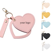 Miroir de poche compact en cuir PU avec logo personnalisé en forme de cœur rotatif, miroirs avec porte-clés pour le maquillage en voyage