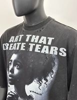T-shirt homme imprimé en coton délavé noir, coupe épaules tombantes, style streetwear tendance, haute qualité