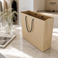 Sac de shopping en papier kraft de qualité supérieure avec poignée en corde torsadée, imprimé sur mesure, écologique, réutilisable, pour l'emballage de cadeaux de marque