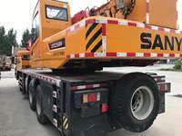 Grue sur camion Sany d'occasion 25 tonnes, modèle 2023, hauteur de levage 60m, avec moteur et boîte de vitesses à faible usure, excellentes performances de travail, à vendre