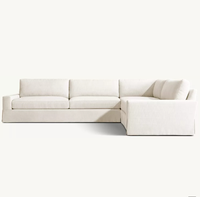 Ensemble de canapés modulaires MAXWELL au design italien classique, en forme de L, avec jupe en tissu éponge, personnalisable et écologique, pour hôtels et appartements