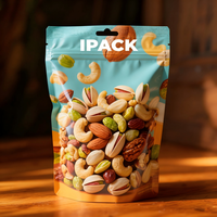 Sachet d'emballage alimentaire tendance 2026 personnalisé en petite série avec fenêtre transparente, pochette verticale pour pistaches et mangues séchées