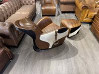 Fauteuil de salon en cuir marron style selle, idéal pour les salles de réunion d'hôtels et les salons de cigares, d'inspiration antique