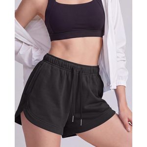 Shorts Deportivos para Mujer FOXA, Cintura Elástica de Altura Media, Corte Delfín con Bolsillos, para Correr, Gimnasio y Entrenamiento - Product Image 3