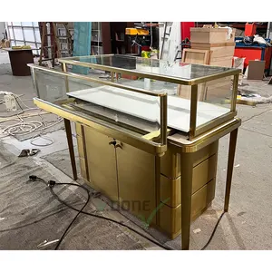 Modern Jewelry Shop Golden Stainless Steel Jewellery Counter Display Cabinet Jewelry Store Decoration Furniture Customized