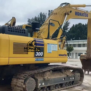 รถขุดไฮดรอลิกตีนตะขาบ Komatsu PC300-7 ของแท้จากญี่ปุ่น ขนาด 30 ตัน พร้อมเครื่องยนต์และเกียร์ กำลัง 180 กิโลวัตต์ - Product Image 1