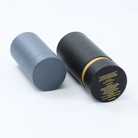Boîte cadeau rigide noire et dorée de luxe en matériaux recyclés avec fermeture magnétique, impression dorée à chaud et pelliculage mat pour crème visage