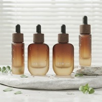 Farbverlauf Mattierte Bernsteinfarbene Dickbodige Hochwertige Hautpflege-Creme Serum Silberkappe Flache Ovale 30ml Glasflasche Holz Schwarz