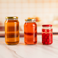Déstockage en stock, prix usine, vente en gros, bocal en verre rond vide de 750 ml (25 oz) de qualité alimentaire pour pâtes avec couvercles à visser
