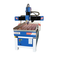 Fabriqué en Chine CNC routeur 6090 3/4 axes CNC bois routeur pour bois aluminium acrylique PVC refroidissement par eau/refroidissement par Air broche CNC