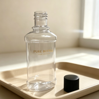 Bouteille diffuseur à roseaux en verre transparent avec bouchon à vis nervuré noir, logo LUMINARA doré en relief, conteneur de parfum vide de luxe