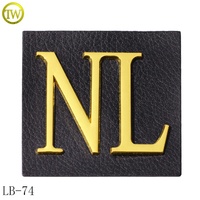 Logo en relief personnalisé Patch Design cuir noir Jeans métal lettre étiquette insigne pour vêtements
