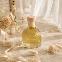 Bouteille diffuseur de parfum en verre transparent en gros, vide, ronde, avec bouchon en liège pour la décoration d'intérieur