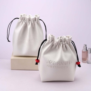 Bolsa de cosméticos de cuero PU con base cuadrada en relieve al por mayor, pequeña, blanca, para viaje, almacenamiento de brochas de maquillaje y dulces, con cordón. - Product Image 3