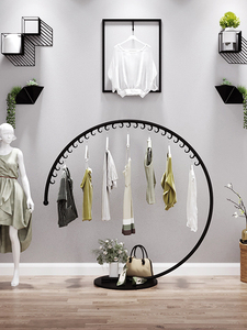 Estante de exhibición Zhongdao moderno para <span class=keywords><strong>ropa</strong></span> de mujer y niño, colgador de vidrio tipo suelo decorativo creativo, celebrante de Internet - Product Image 3