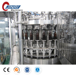 Machine trois en un pour le rinçage, le remplissage et le capsulage de boissons gazeuses dans des bouteilles en verre - Product Image 3