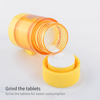 Mini déchiqueteuse de coupe-pilule en plastique portable avec organisateur de boîte de rangement ronde Matériau PP pour une gestion pratique des pilules
