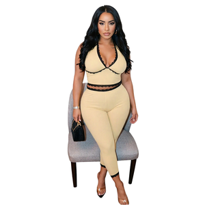 Ensemble pantalon et haut court moulant en polyester côtelé, couleur unie, avec col licou, bordure en dentelle, dos nu, laçage, effet amincissant, style sexy pour club - Product Image 1