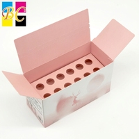 Boîte en papier rose et blanc à dégradé personnalisé avec insert à 10 trous pour le stockage d'ampoules, de flacons et de liquides oraux