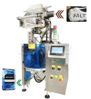 Machine d'emballage entièrement automatique pour le remplissage et la fermeture de sachets volumétriques de matériaux granulaires pour produits alimentaires, chimiques et gonflés