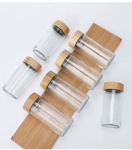 Pot à épices rond personnalisé de 90 ml, 120 ml, 4 oz, bouteille en verre pour poivre et assaisonnements avec couvercle en bambou et en bois - Product Image 5