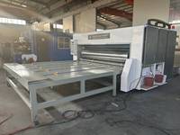 Machine semi-automatique d'impression flexographique, de découpe et de rainurage pour cartons
