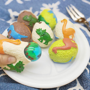 Nuevo Juguete Sensorial Antiestrés de Dinosaurio en Forma de Huevo con Pelota Antiestrés de Goma en Forma de Perro para Niños - Product Image 2