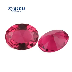 Factory price aqua Rose red shape glass in Wuzhou / aqua colored gemstones