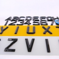 Lettere in acrilico diamantato lucido 79*50mm, numeri autoadesivi neri smussati per targa acrilica UK