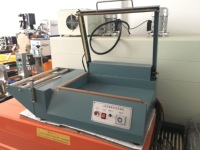 Machine de scellage semi-automatique à film thermorétractable en L, découpe manuelle pour canettes et bouteilles de boissons, utilisation facile, garantie 12 mois
