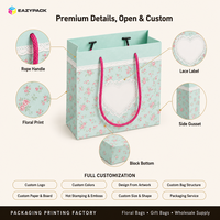 Sacs cadeaux écologiques personnalisés en gros, couleur vert-bleu mat, avec imprimé bouton de rose et nœud à carreaux mignon, pour la vente de parfums au détail