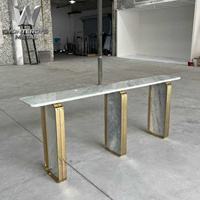 Table console haut de gamme pour usage commercial, plateau en marbre avec pieds en métal doré pour projet de hall d'hôtel