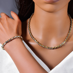 Ensemble collier et bracelet élégant en acier inoxydable plaqué or 18 carats, anti-ternissement, robuste, avec chaîne segmentée double teinte brillante, vente en gros - Product Image 3