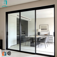 Porte coulissante intérieure en aluminium avec option verre dépoli pour la séparation des espaces humides de la salle de bain et de la buanderie