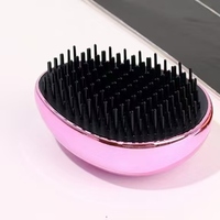 Massage coiffure pointe de dent arrondie sans noeud poignée confortable maison peigne en forme d'oeuf