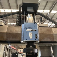 Centre d'usinage à 5 axes de type portique Doosan DCM-2740U coréen disponible à la vente
