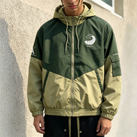 Veste coupe-vent à capuche bicolore pour homme, imprimé graphique double face, fermeture éclair, style vintage streetwear décontracté