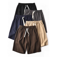Shorts de sport en coton uni pour homme, de haute qualité, décontractés, avec cordon de serrage, amples et confortables, avec poches