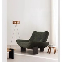 Fauteuil en tissu monoplace de style français vintage, minimalisme italien, modèle de designer pour Emmi, en bois de frêne, décontracté, avec fonction massage