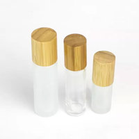 Flacon roll-on en verre dépoli Mingsheng de luxe 5ml 10ml avec bouchon en bambou, flacon vide pour huiles essentielles et parfums, vente en gros