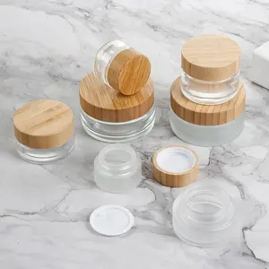 Support Customized LOGO 30g50ml100ml200ml Empty Bamboo Lid Amber Clear Frosted Face Body Cream Cosmetic Glass Cream Jar