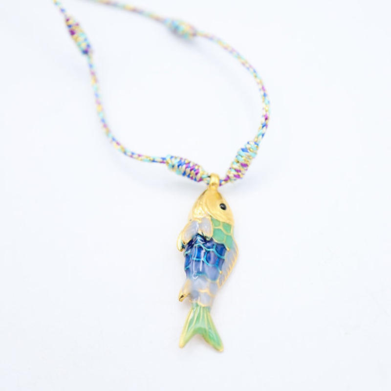 Collier petit poisson bleu-vert