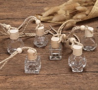 Vente chaude Verre Transparent 8ml 10ml Diffuseur De Voiture Bouteille De Parfum Vide Conception Suspendue avec Bouchon À Vis Joint