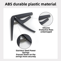 Clip universel de changement de hauteur en plastique ABS en gros pour ukulélé Logo personnalisé accessoire d'instrument de musique