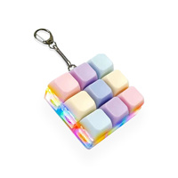 En gros, Porte-clés anti-stress en plastique, lumineux et étanche, avec 9 boutons colorés, design axe et touches carrées, jouet sensoriel Fidget Tide Toys