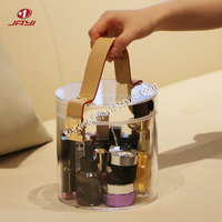 Boîte de rangement cosmétique ronde personnalisée en acrylique Lucite Organisateur de rangement de maquillage avec poignée en cuir