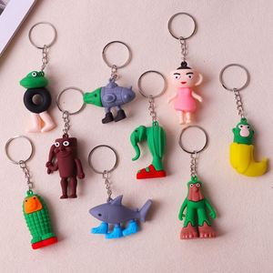 Accessoires de porte-clés transfrontaliers classiques, thèmes Montagnes, Mers, Homme en caoutchouc, Requin, Tung, amusants et abstraits, en boîte surprise - Product Image 1