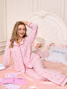 ชุดนอนผู้หญิงลายทางสีชมพูพิมพ์ลายโบว์ ผ้าเทนเซลไมโครโมดอล แขนยาว ติดกระดุม มีกระเป๋า - Product Image 4