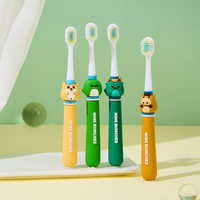 Brosse à dents à poils souples avec poignée en caoutchouc anti-dérapant pour enfants